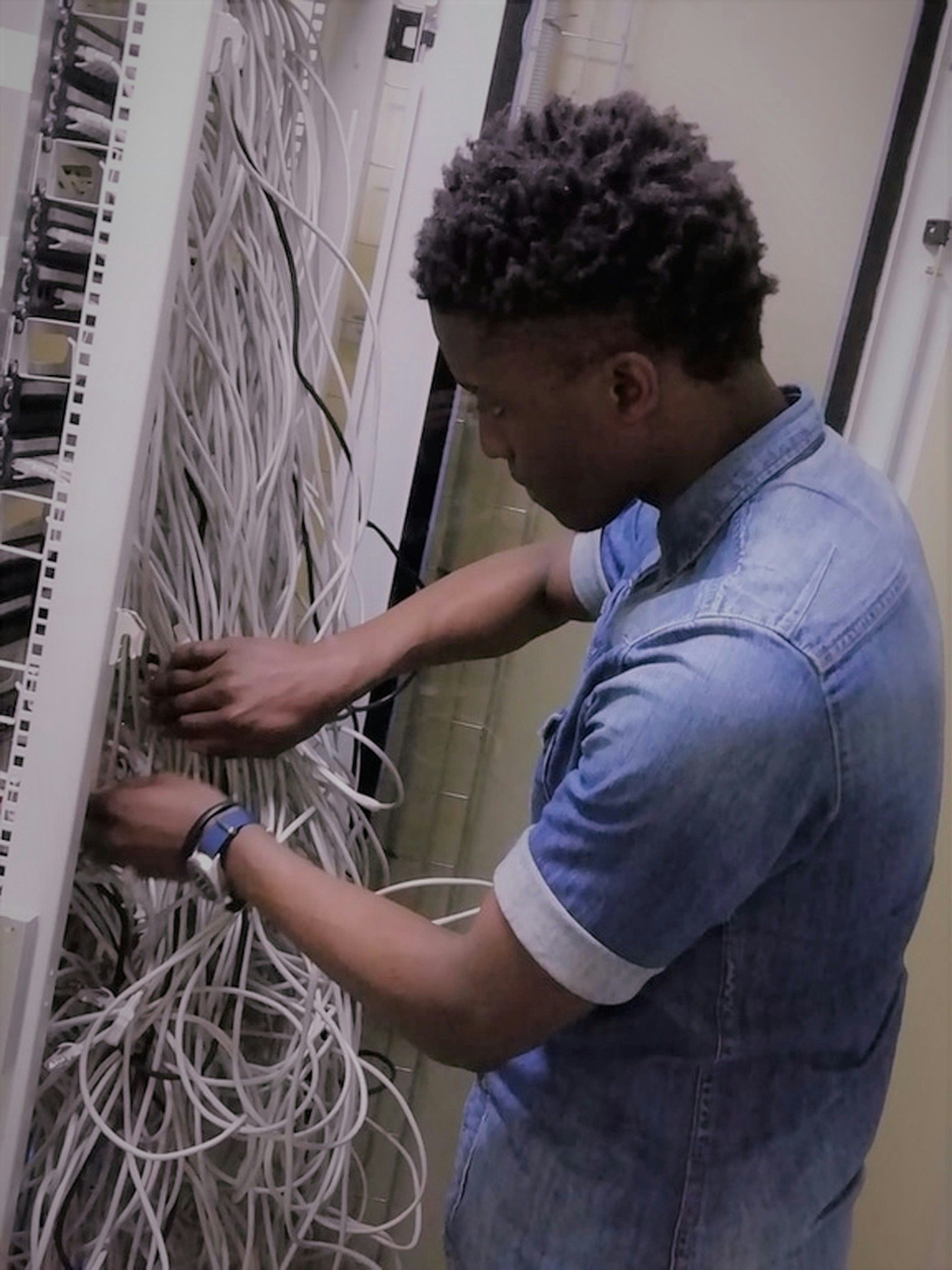 Technician working on structured cabling